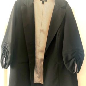 Black blazer with quarter length sleeve. Size 2 from Torrid